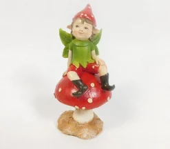 Elf Sitting on Mushroom