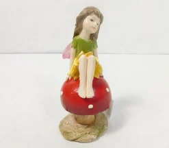 Fairy Sitting on Mushroom