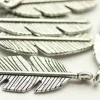 Feather Charm – Piece (view colors)