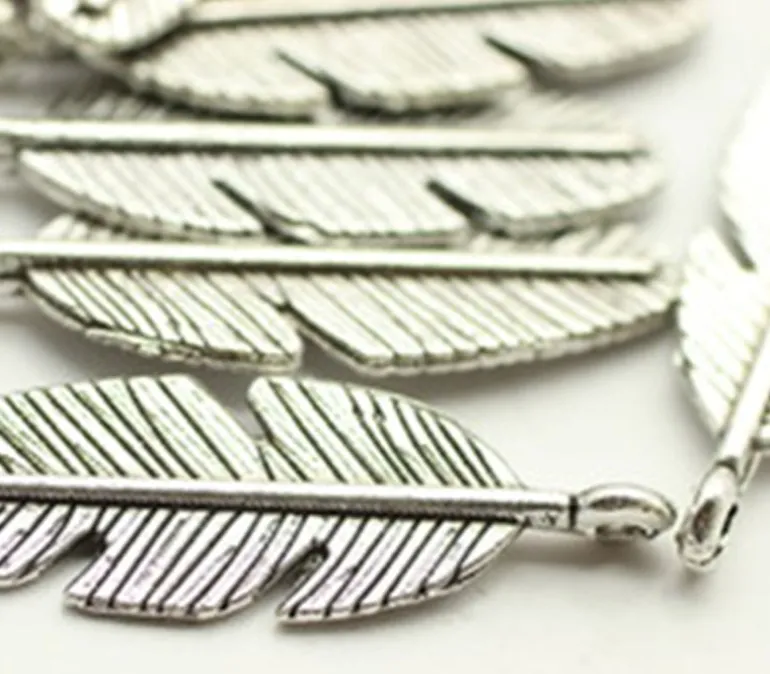 Feather Charm – Piece (view colors)