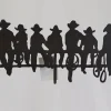 Metal Cowboys on a Fence – 12-inch x 6-inch