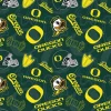 University of Oregon Ducks, Logo and Helmet Tossed on Dark Green